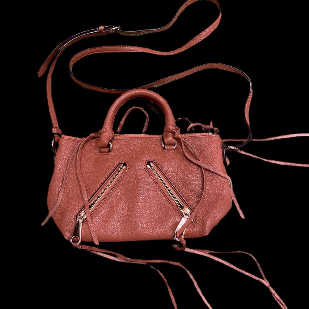 Rebecca Minkoff mini bag. Great color that matches with everything. Lightly used